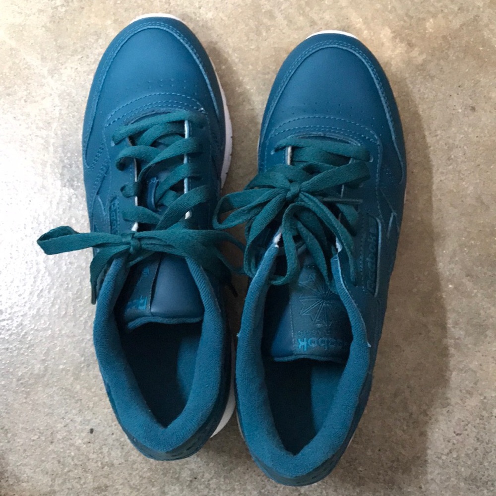 Turquoise Reebok tennis shoe